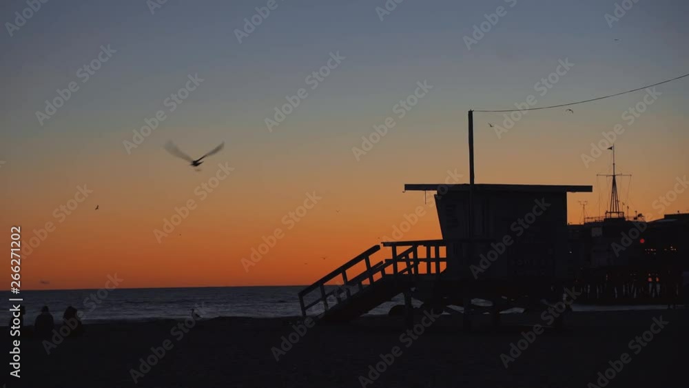 Lifeguard on the beach in Santa Monica at sunset Lifeguard on the beach in Santa Monica at sunset