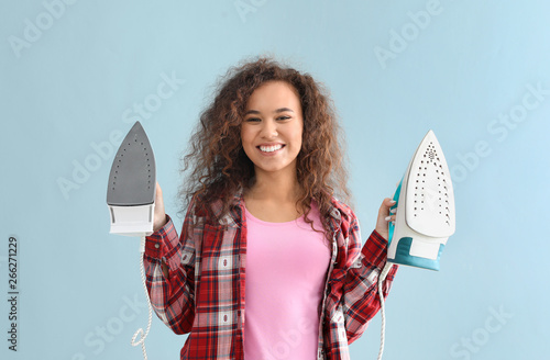 Happy Young Woman Holding I...