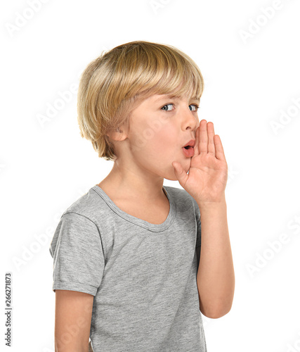 Gossiping little boy on white background