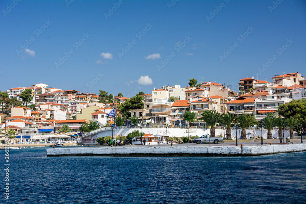 Neos Marmaras, Halkidiki, Greece - June 29, 2014: View of the city Neos Marmaras from the sea