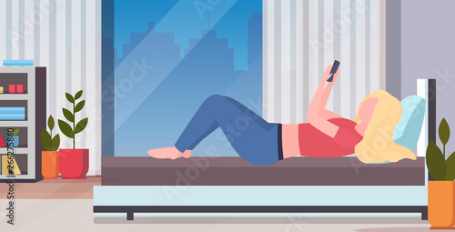 blonde woman lying on bed girl taking selfie photo on smartphone camera modern bedroom interior female cartoon character flat full length horizontal