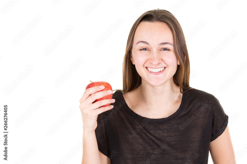 Charming smiling young woman holding apple Charming smiling young woman holding apple