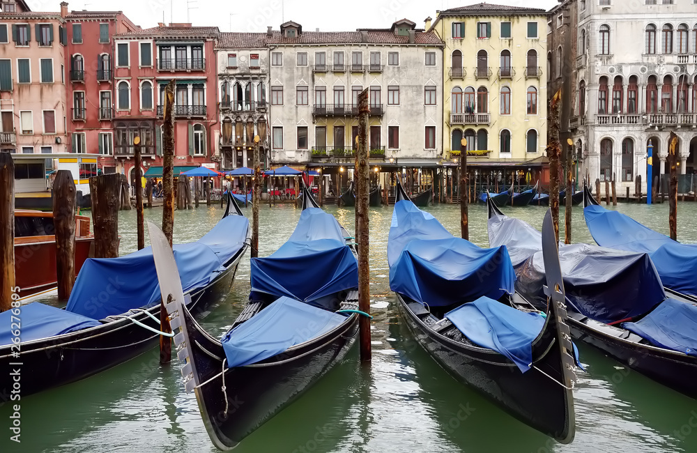Pier with gondolas in the Venice, Italy