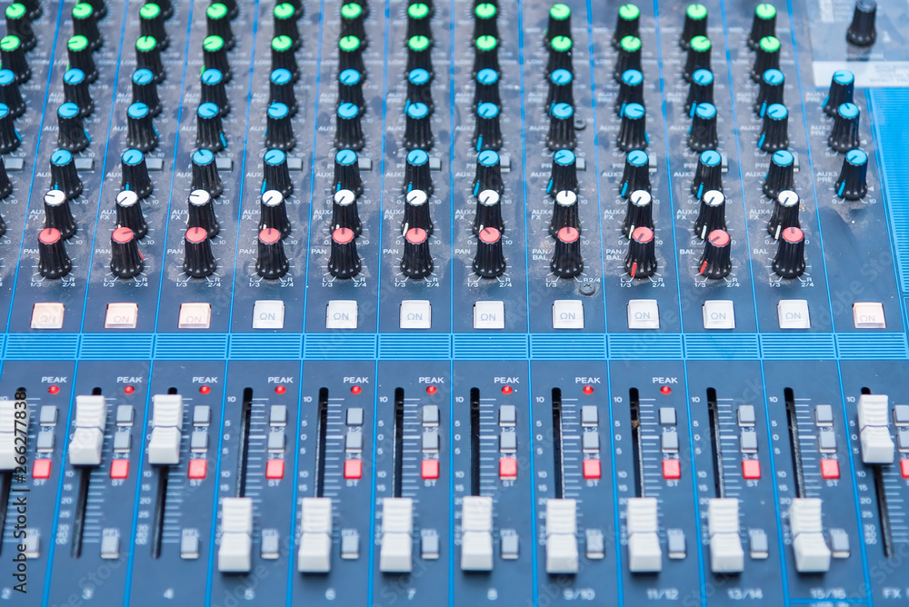 Fototapeta premium Professional Audio dj mixer console, sound tools and gear, studio equipment picture, selective focus.