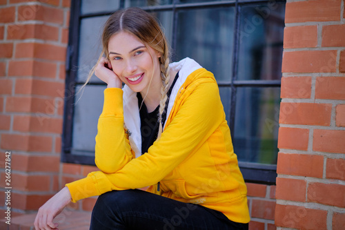 Attractive Woman In Urban Background