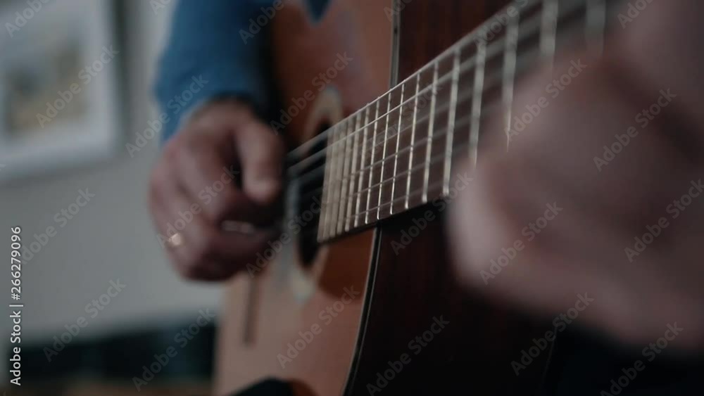 Old man playing acoustic guitar fingers hand close. Old man playing acoustic guitar fingers hand close.