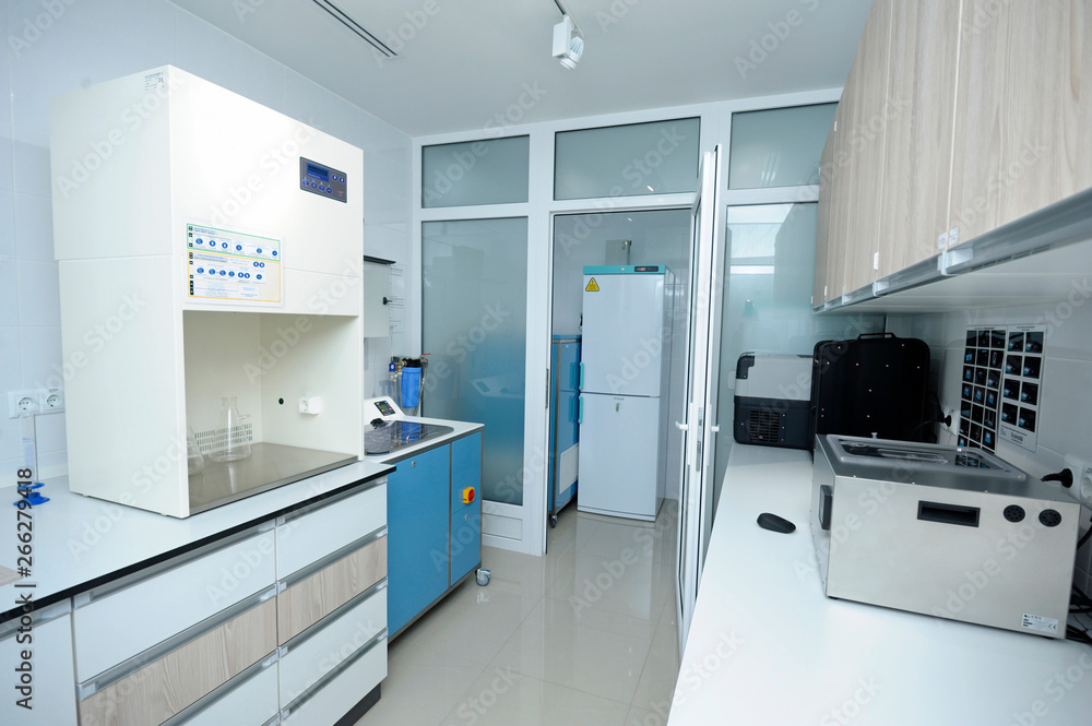 Interior of the Human Milk Bank laboratory: lab lockers, tables milk heating box, freezers, milk pasteryzator Interior of the Human Milk Bank laboratory: lab lockers, tables milk heating box, freezers, milk pasteryzator