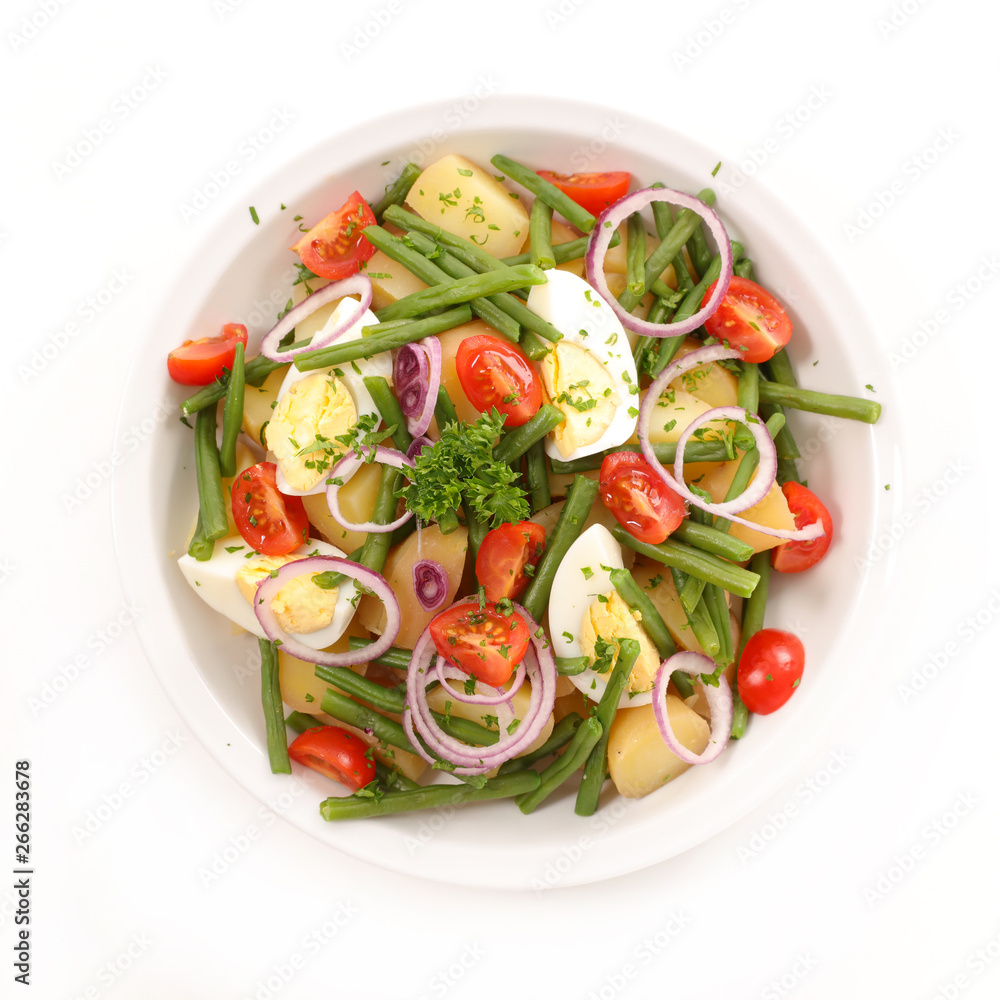 vegetable salad with egg, potato, bean and onion isolated on white background vegetable salad with egg, potato, bean and onion isolated on white background