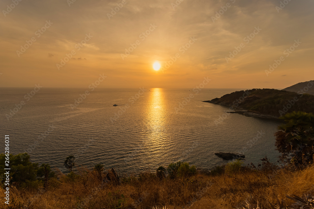 The sun is falling in sunset time at Promthep Cape in Phuket, Thailand.