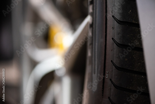Close up detail of a tyre mounted on a luxury alloy wheel