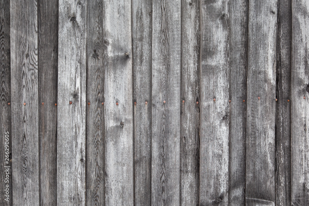 Fototapeta premium Background of old grey boards in vertical orientation