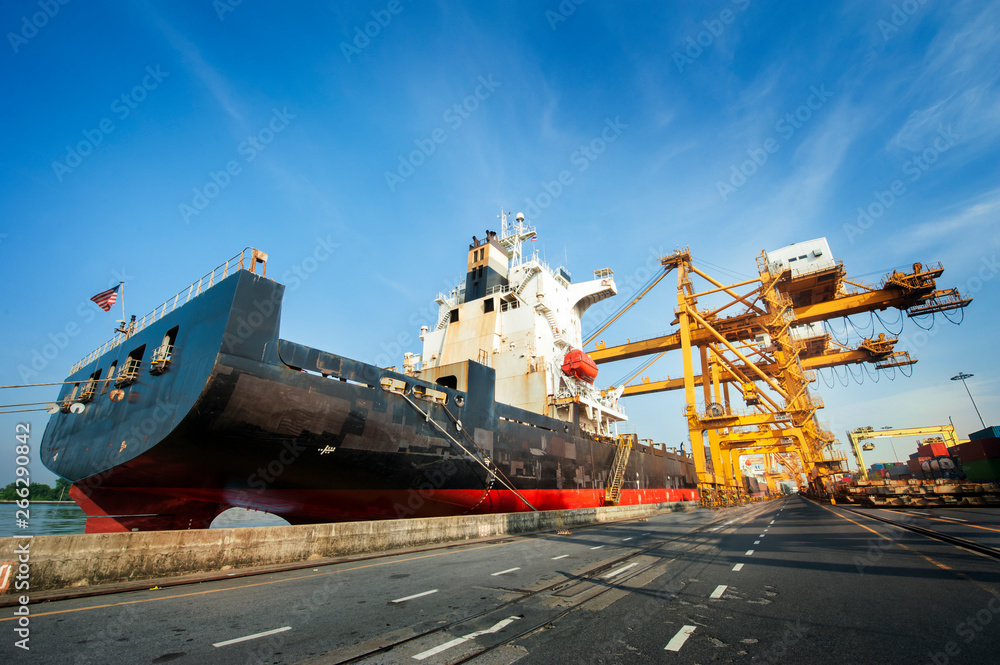 Fototapeta premium Transport logictic industry concept of cargo, truck, transportation, container box, vessel ship and working crane, import export business.