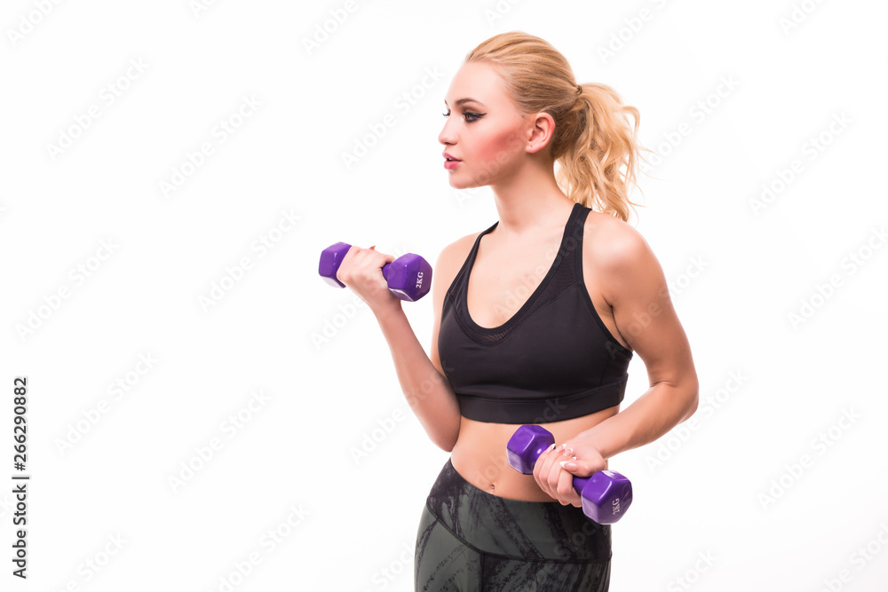Young happy smiling blond woman in sportswear, doing fitness exercise with dumbbells, isolated on white background Young happy smiling blond woman in sportswear, doing fitness exercise with dumbbells, isolated on white background