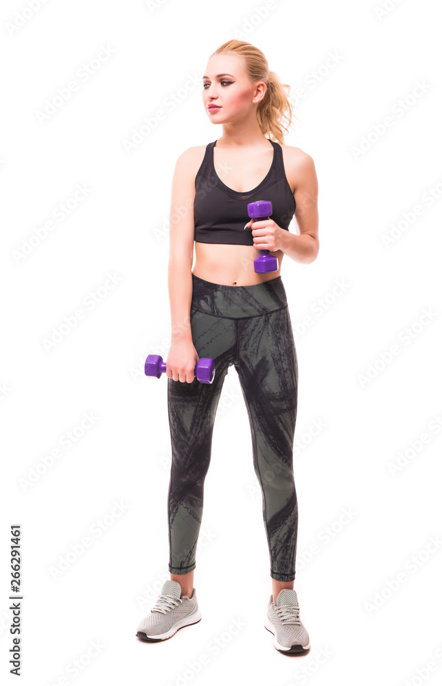 Photo of slim sporty woman doing exercises with small dumbbells isolated over white background Photo of slim sporty woman doing exercises with small dumbbells isolated over white background