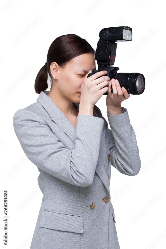 Asian Woman Photographer hold camera with external flash point to shoot subject, wear formal black suit. studio lighting white background isolated copy space, reporter journalist take photo celebrity Asian Woman Photographer hold camera with external flash point to shoot subject, wear formal black suit. studio lighting white background isolated copy space, reporter journalist take photo celebrity