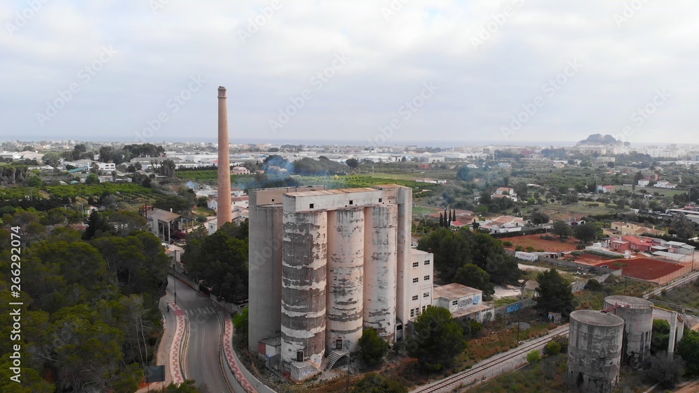 Aerial view of an old and ruined cement factory.
