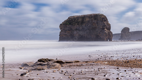 Marsden Rock and Beach, South Shields, Tyne and Wear, England,  on a windswept day,