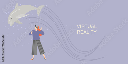 Banner with a girl in virtual reality glasses smiling and stretching hands to the virtual dolphin. Play and learn with the modern technology