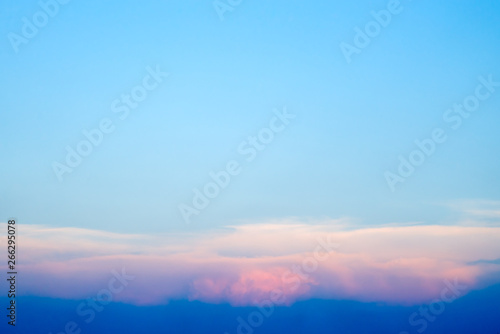 Colorful clouds on blue sky with copy space 