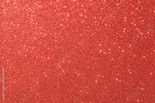 red glitter macro background. Close-up shot of glittery texture.