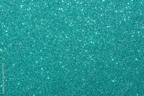 blue glitter macro background. Close-up shot of glittery texture.