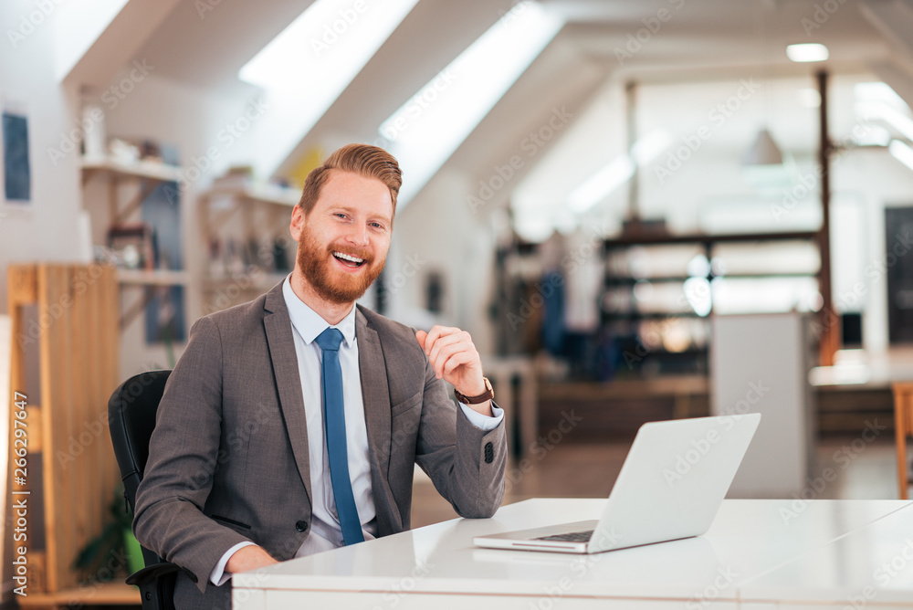 Portrait of positive exotic businessman at work. Portrait of positive exotic businessman at work.
