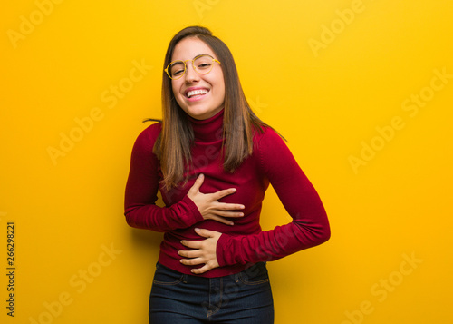Young intellectual woman laughing and having fun