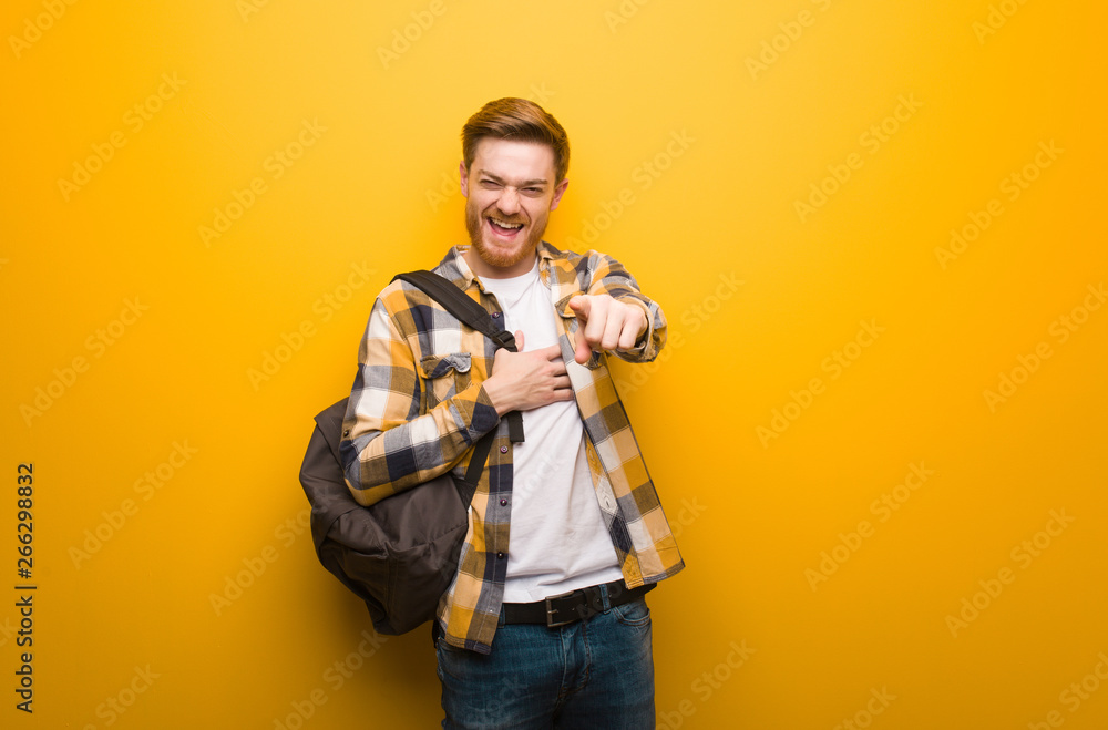 Young redhead student man dreams of achieving goals and purposes Young redhead student man dreams of achieving goals and purposes