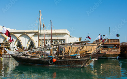 Traditional jalibut dhow boats in the Arabian Gulf for fishing and tourism, Doha, Qatar photo
