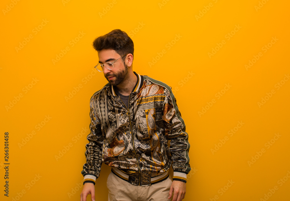 Young cool man surprised and shocked Young cool man surprised and shocked