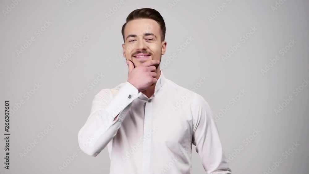 Man looking at camera and flirting. Happy smiling guy. Man looking at camera and flirting. Happy smiling guy.