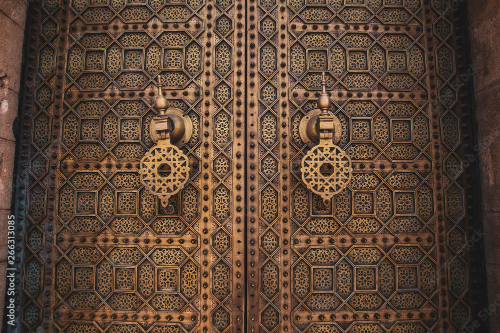 Beautifully decorated Moroccan Doors of the Hassan Mosque in Rabat, Morocco
