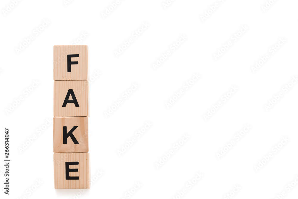 black fake lettering made of wooden blocks isolated on white black fake lettering made of wooden blocks isolated on white