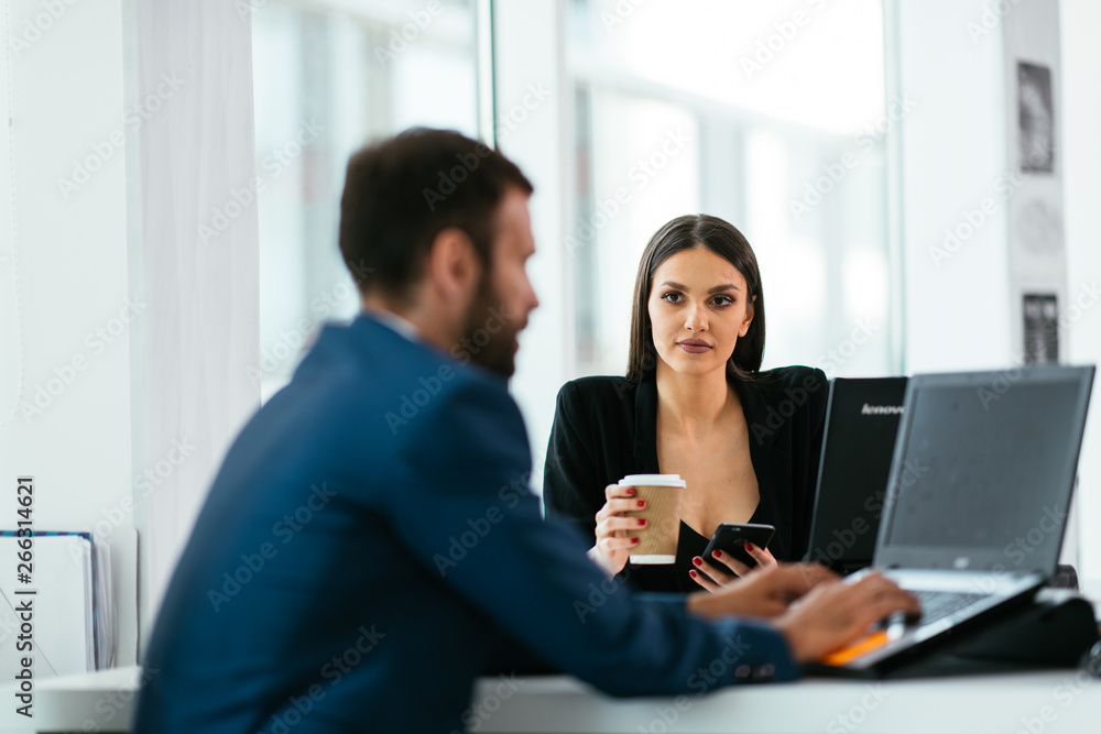 Colleagues working together, having coffee. Managers at the meeting. Colleagues getting ready for conference. Colleagues working together, having coffee. Managers at the meeting. Colleagues getting ready for conference.
