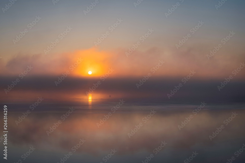 Sunrise on the Northern Dvina. morning mist over the river Sunrise on the Northern Dvina. morning mist over the river