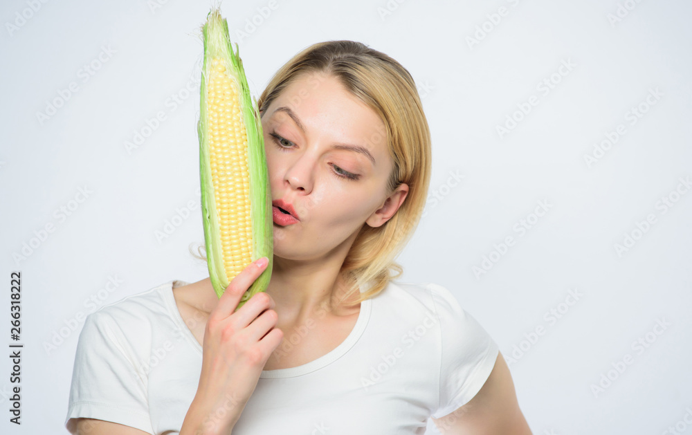 the flavor is so rich. healthy teeth. hunger. corn crop. vitamin and dieting food. woman eating corn. vegetable harvest. agriculture and cultivation. Farming, farmer girl with maize. feel real hunger the flavor is so rich. healthy teeth. hunger. corn crop. vitamin and dieting food. woman eating corn. vegetable harvest. agriculture and cultivation. Farming, farmer girl with maize. feel real hunger