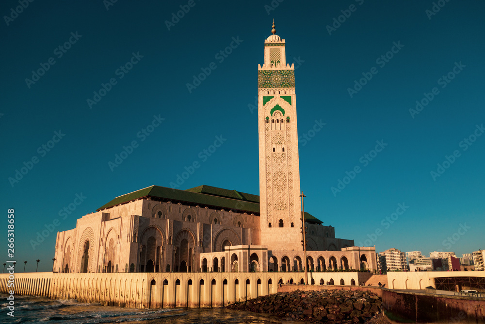 scenic view of Hassan II mosque from the walk alley at sunset - Casablanca - Morocco