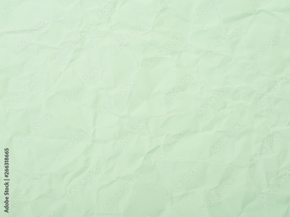 Fototapeta premium Green crumpled paper texture background