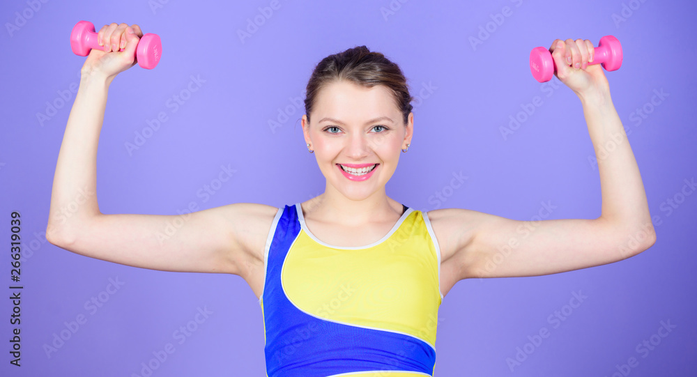 Health diet. Success. Strong muscles and power. Happy woman workout with barbell. Sport dumbbell equipment. Athletic fitness. Sporty woman training in gym with dumbbell. fitness dumbbell Health diet. Success. Strong muscles and power. Happy woman workout with barbell. Sport dumbbell equipment. Athletic fitness. Sporty woman training in gym with dumbbell. fitness dumbbell