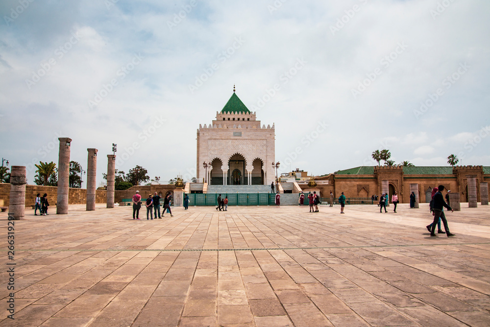 Fototapeta premium The Mausoleum of Mohammed V is a historical building located on the opposite side of the Hassan Tower on the Yacoub al-Mansour esplanade in Rabat, Morocco