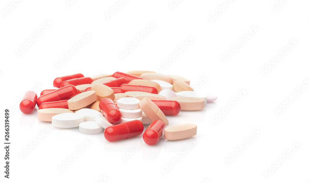 medical red and white pills and capsules with medicine are on a white background medical red and white pills and capsules with medicine are on a white background