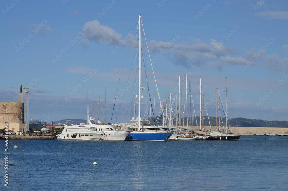 White boats in Alghero harbor