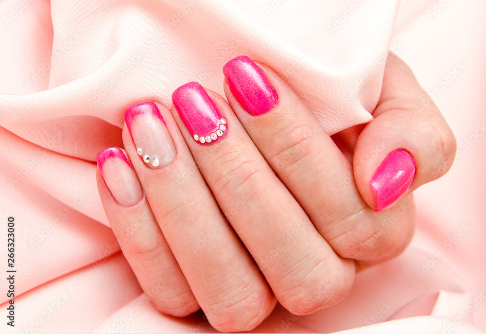 Woman's nails with beautiful manicure fashion design Woman's nails with beautiful manicure fashion design