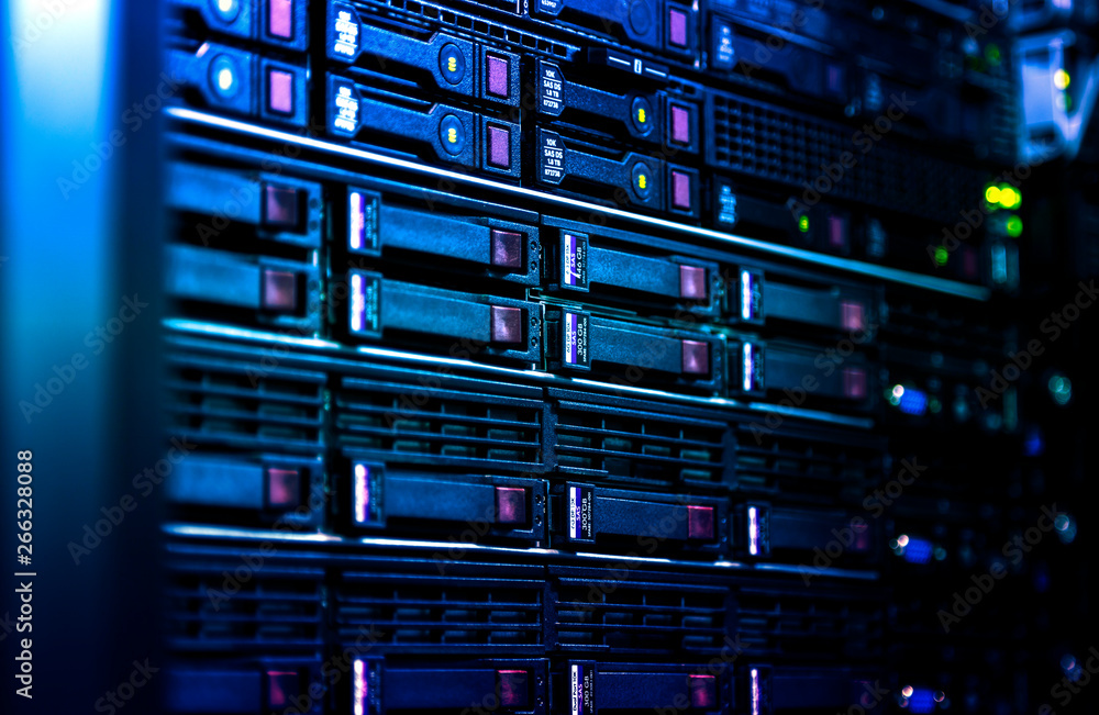 Close up server rack cluster in a data center selected focus, narrow depth field Close up server rack cluster in a data center selected focus, narrow depth field