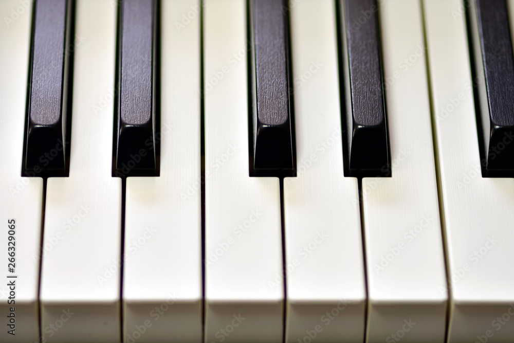 Keys of a digital piano, soft focusing, creative mood of a person improvisation and creativity. Midi piano keyboard for playing digital music and making remixes. Keys of a digital piano, soft focusing, creative mood of a person improvisation and creativity. Midi piano keyboard for playing digital music and making remixes.