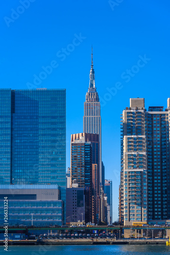 View from East Side River to Empire State Building - Manhatten Skyline of New York  USA