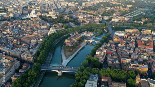 Aerial view of hospital on the Tiber Island, on the Tiber River, Rome, Italy. Coliseum.