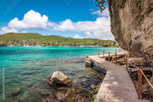 Fototapeta Naklejka Na Ścianę i Meble -  A new cliff side boardwalk trail from Belmont beach to Princess Margaret beach, Bequia Island.