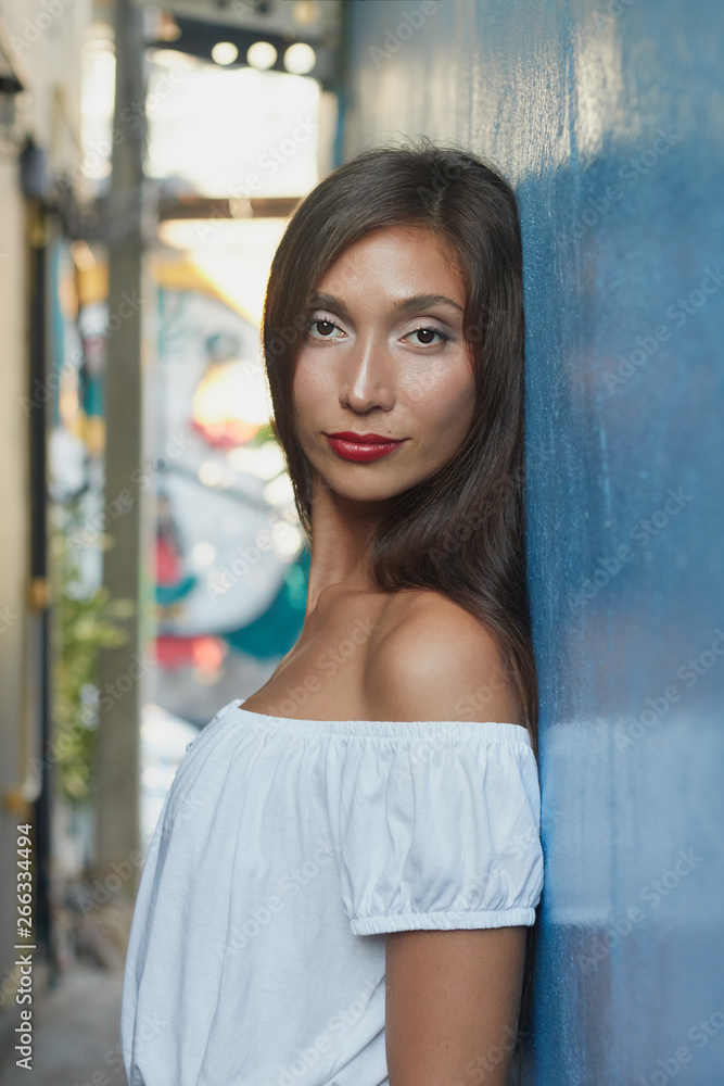 Fototapeta premium Portrait of a girl on the streets