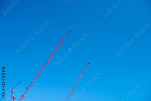 tower crane in blue sky in sunny day